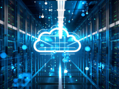 Cloud computing icon glowing in a server room, representing cloud data storage and IT infrastructure services.